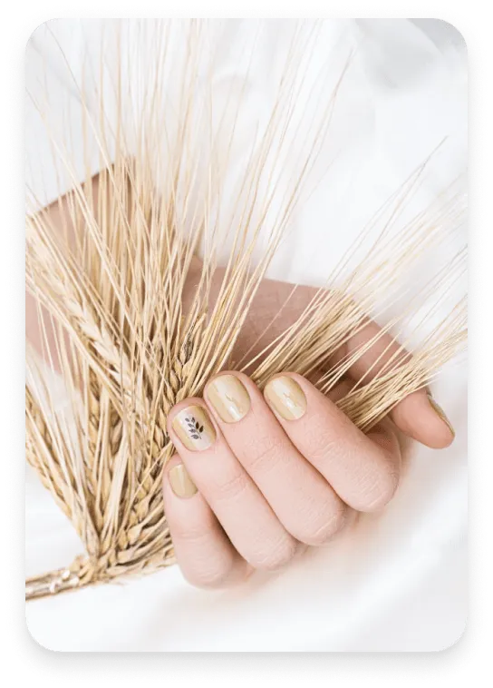 golden manicure with spikelet pattern