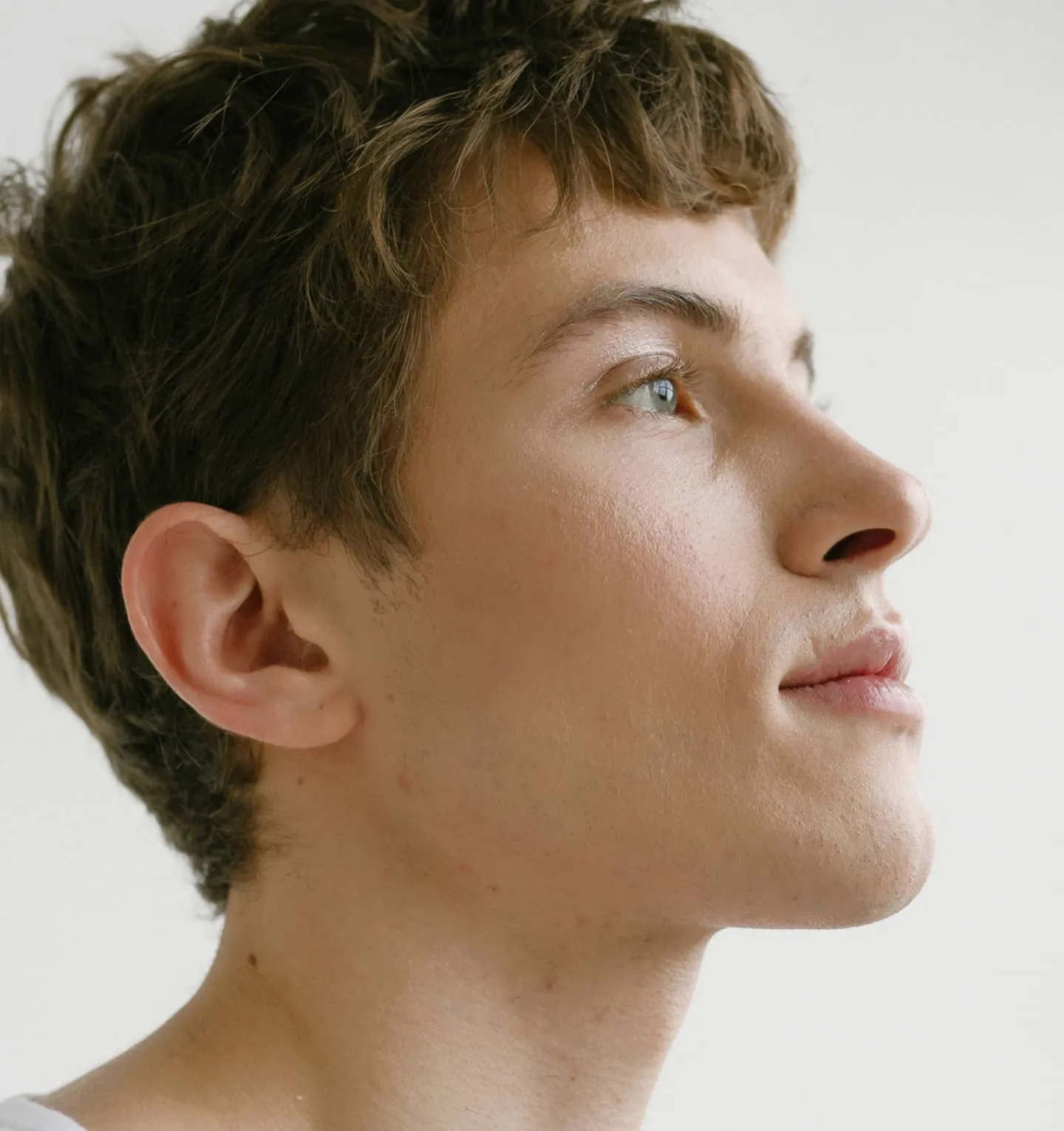 photo of a young man in profile